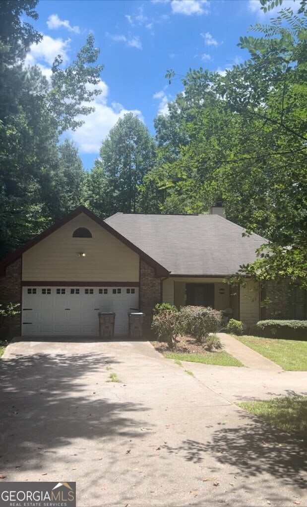 single story home with a garage