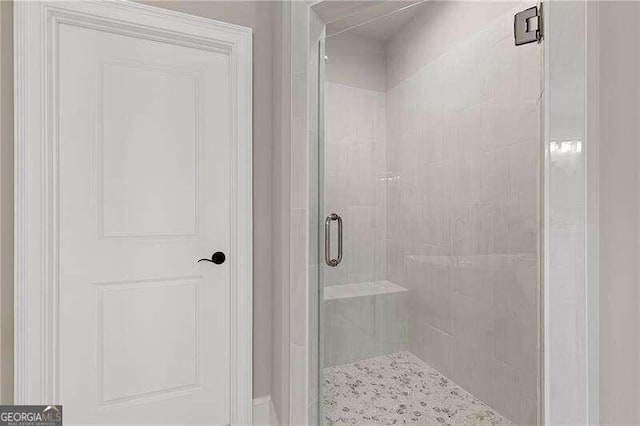 bathroom featuring walk in shower