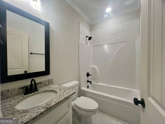 full bathroom featuring vanity, toilet, ornamental molding, washtub / shower combination, and tile patterned flooring