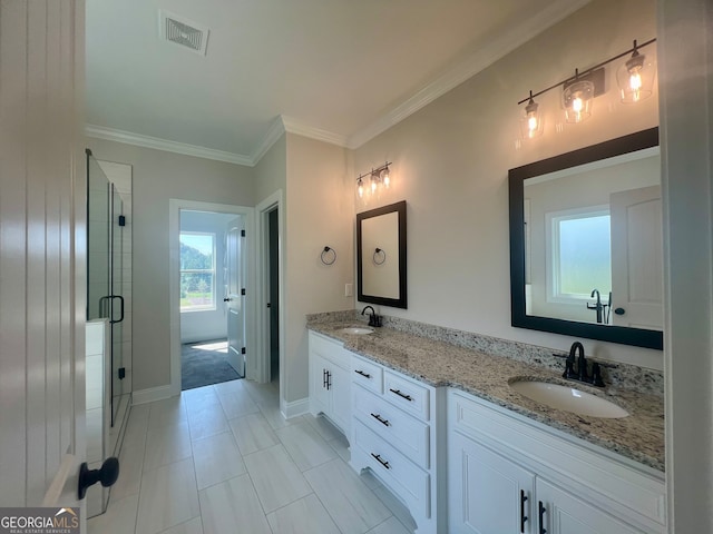 bathroom with ornamental molding, tile patterned floors, vanity, and a shower with shower door