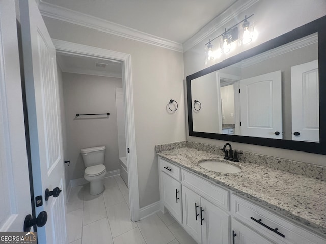 bathroom featuring ornamental molding, vanity, toilet, and tile patterned floors