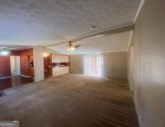 unfurnished living room with dark carpet, a textured ceiling, crown molding, and ceiling fan