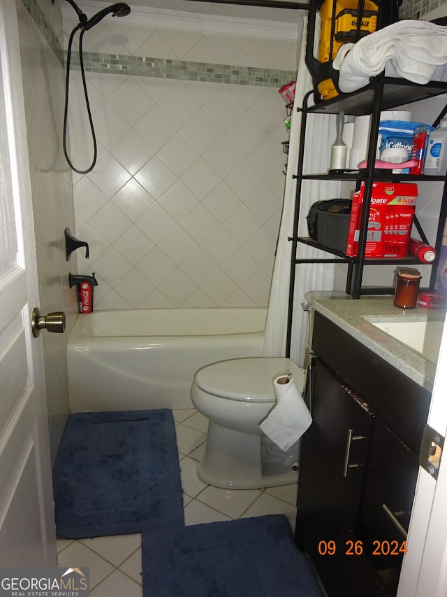 full bathroom featuring tile patterned floors, vanity, shower / tub combo, and toilet