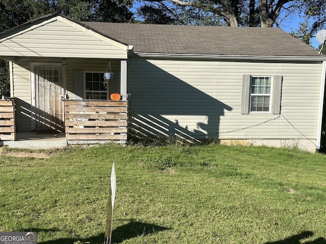 exterior space featuring a front lawn