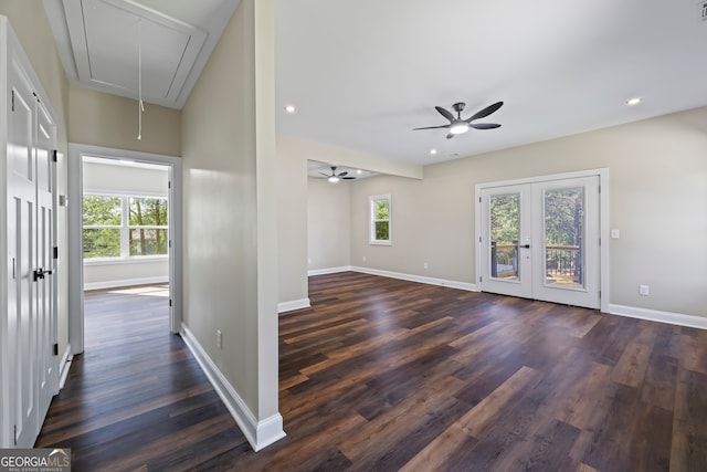 unfurnished room with ceiling fan, french doors, and dark hardwood / wood-style flooring