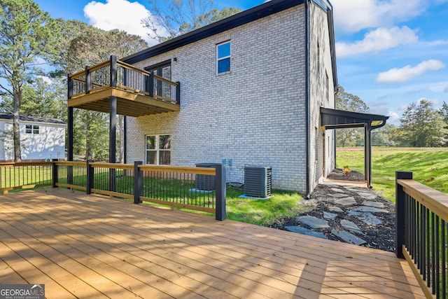 wooden terrace with a lawn and central AC unit