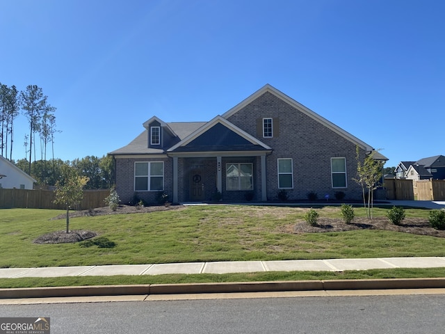 view of front of home with a front lawn