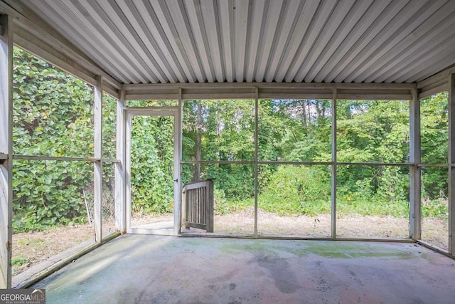 unfurnished sunroom featuring a healthy amount of sunlight