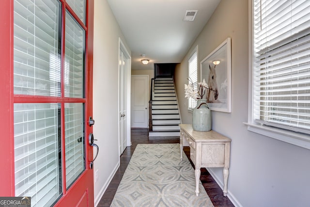 foyer entrance featuring hardwood / wood-style flooring