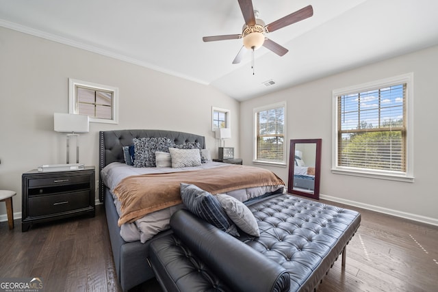 bedroom with crown molding, ceiling fan, vaulted ceiling, and dark hardwood / wood-style flooring