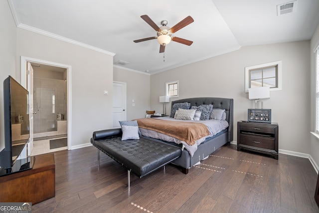 bedroom with dark wood-type flooring, ensuite bath, vaulted ceiling, and ceiling fan