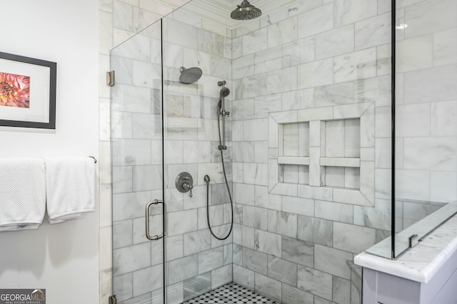 bathroom featuring a shower with door