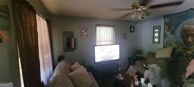 living room featuring ceiling fan