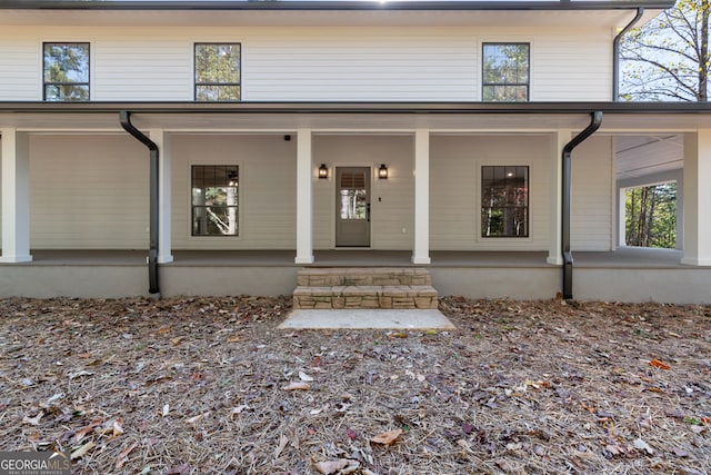 property entrance with a porch