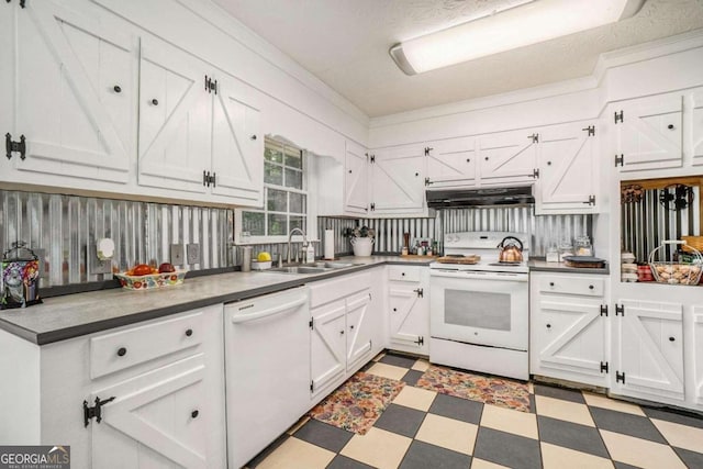 kitchen featuring white cabinetry, white appliances, sink, and a textured ceiling