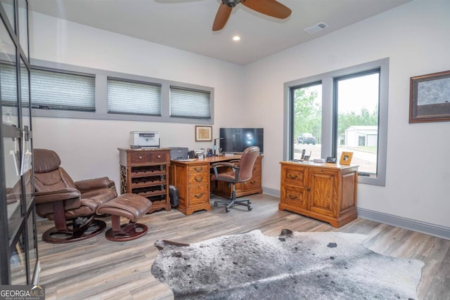 office area featuring ceiling fan and light hardwood / wood-style floors