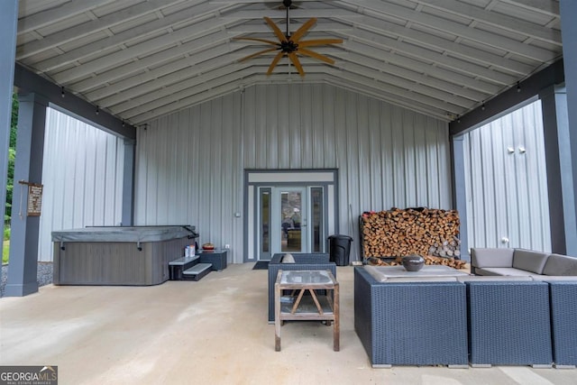 exterior space with french doors, an outdoor living space, a hot tub, and ceiling fan