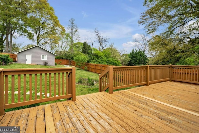 wooden deck with a lawn