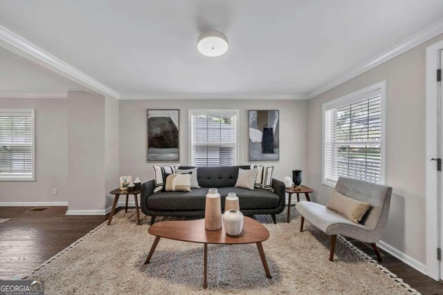 dining room featuring ornamental molding, vaulted ceiling, and dark hardwood / wood-style flooring