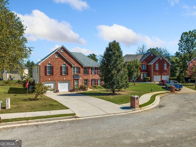 view of front of home with a front yard and a garage