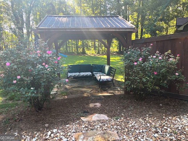 view of yard with a gazebo and outdoor lounge area