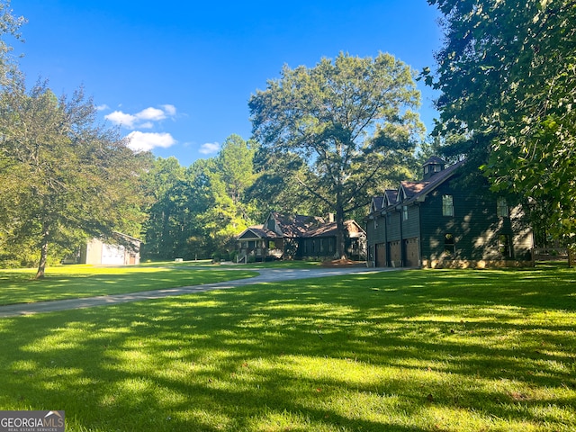 view of yard featuring a garage