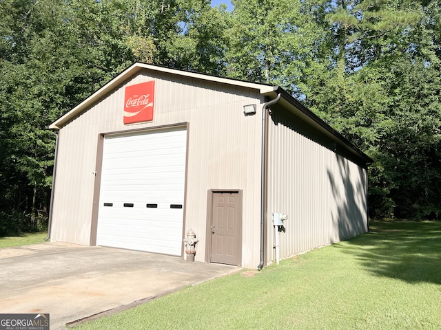 garage with a lawn