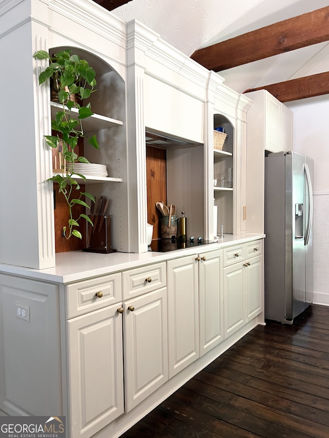 bar with dark wood-type flooring, black electric stovetop, stainless steel fridge with ice dispenser, a textured ceiling, and white cabinetry