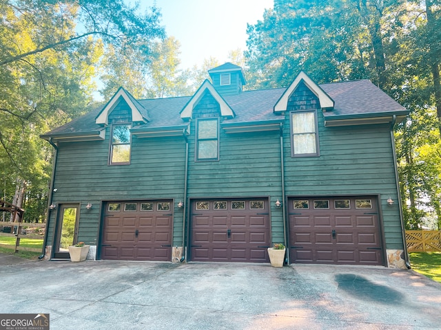 view of front of home with a garage