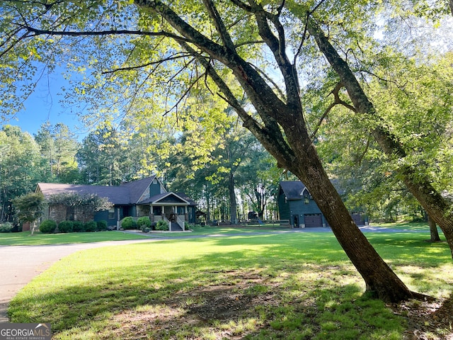 view of yard with a garage