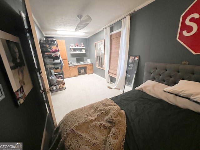 bedroom with carpet flooring and a textured ceiling