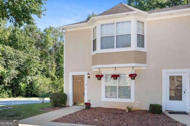 3127 Fields Dr, Stonecrest, GA 30038 - view of front facade featuring stucco siding