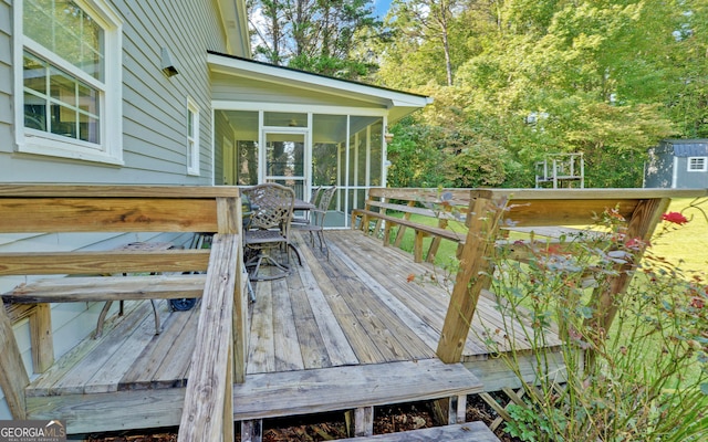 wooden terrace with a sunroom