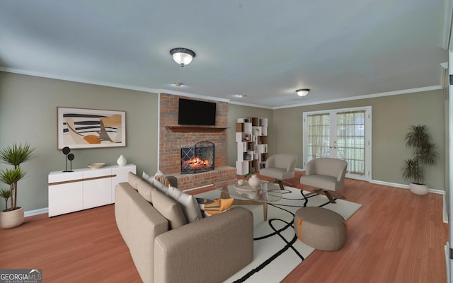 living room featuring crown molding, a brick fireplace, and light wood-type flooring