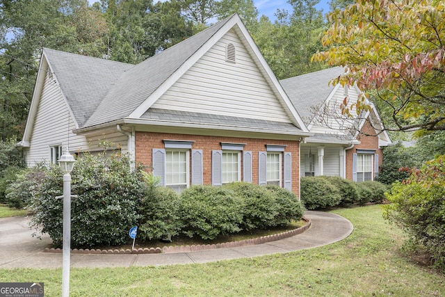 2797 Club Forest Dr, Conyers, GA 30013 - view of front of home with brick siding and a front lawn