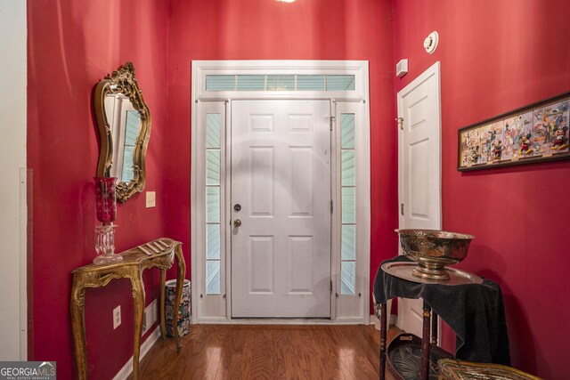 2797 Club Forest Dr, Conyers, GA 30013 - entryway with wood finished floors and baseboards