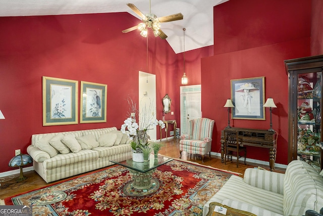 2797 Club Forest Dr, Conyers, GA 30013 - living room featuring ceiling fan, wood finished floors, baseboards, and high vaulted ceiling