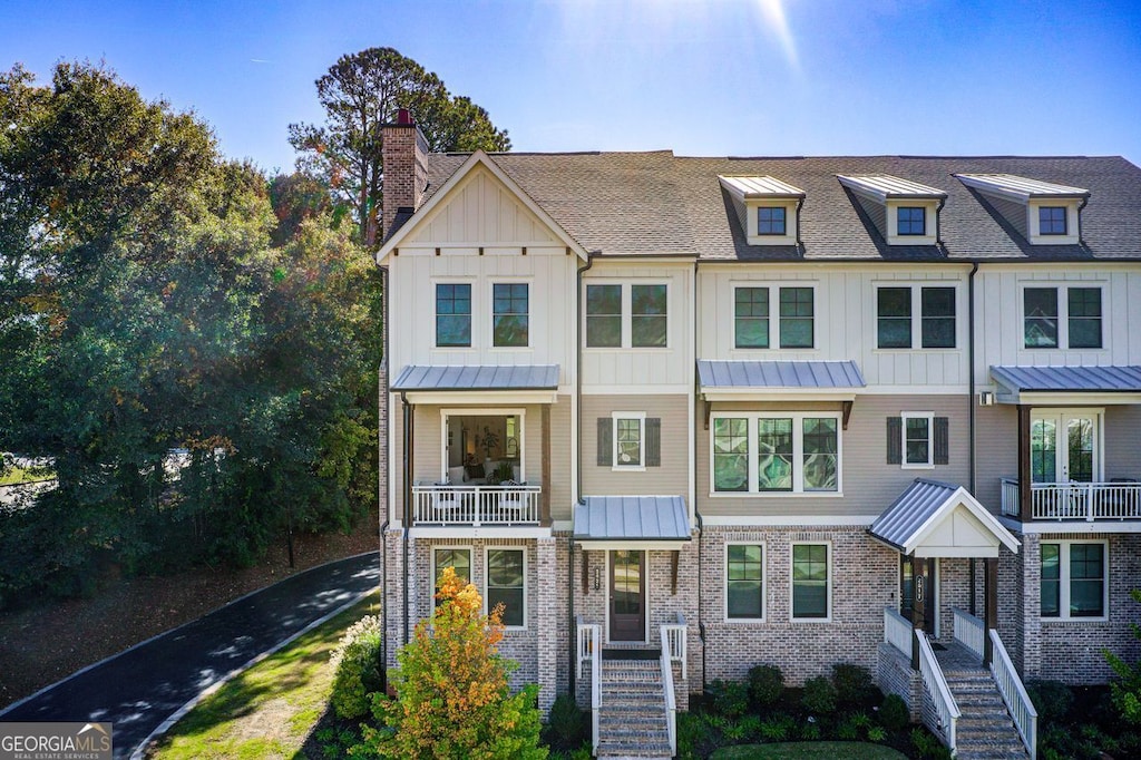 view of property featuring a balcony