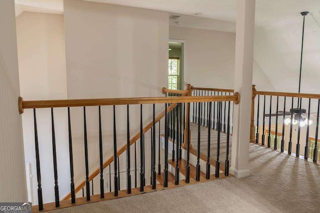 staircase with carpet