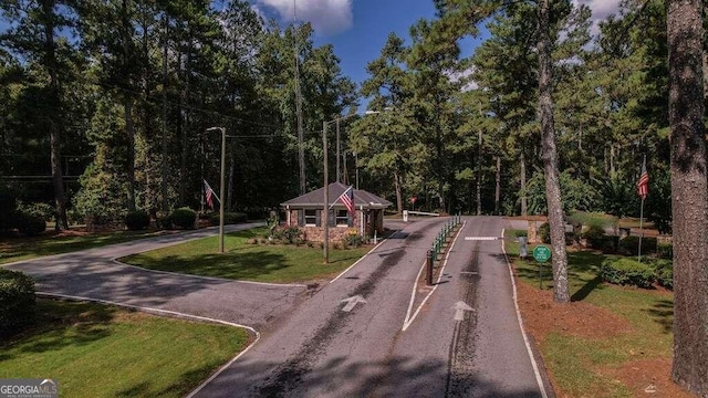 view of home's community featuring a yard