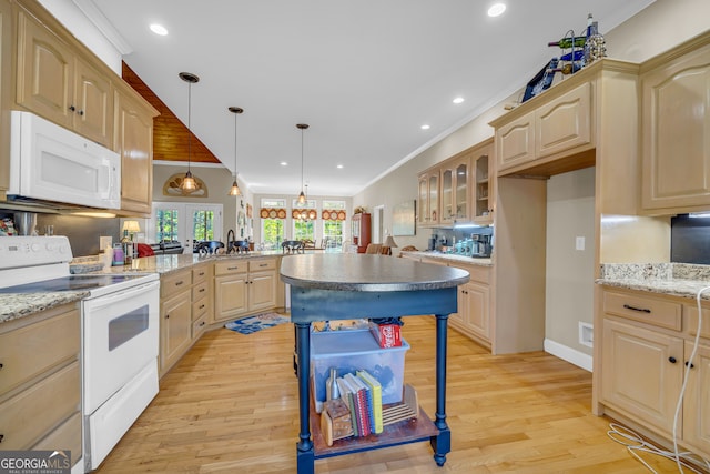 kitchen with white appliances, light brown cabinetry, light hardwood / wood-style flooring, dark stone countertops, and ornamental molding