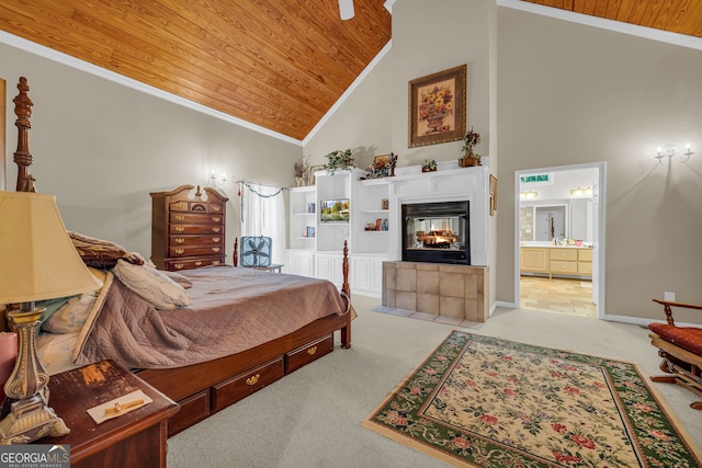 carpeted bedroom featuring high vaulted ceiling, wooden ceiling, ornamental molding, ensuite bathroom, and a multi sided fireplace