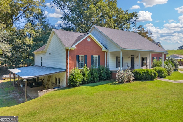 view of front of home featuring covered porch and a front yard