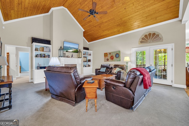 carpeted living room with ornamental molding, high vaulted ceiling, ceiling fan, and wood ceiling