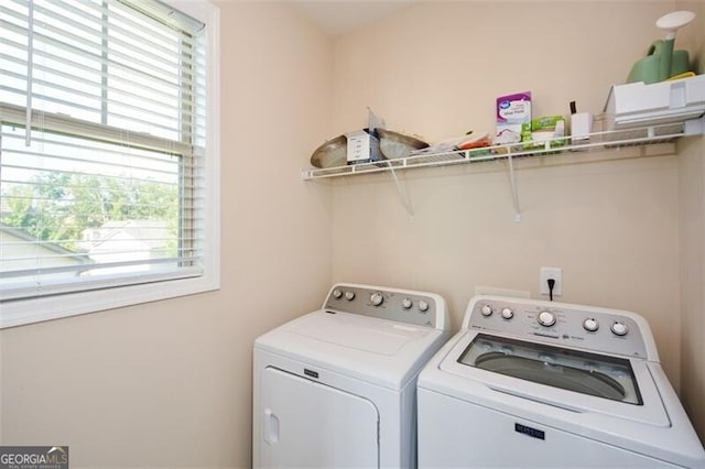 washroom featuring independent washer and dryer