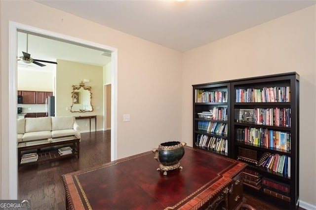 office area with ceiling fan and hardwood / wood-style floors