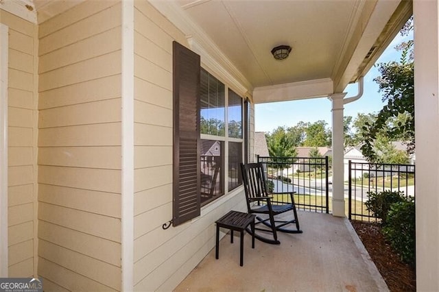 balcony featuring a porch