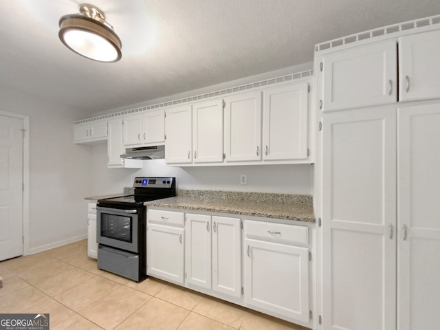 kitchen featuring light stone countertops, electric stove, light tile patterned floors, and white cabinets