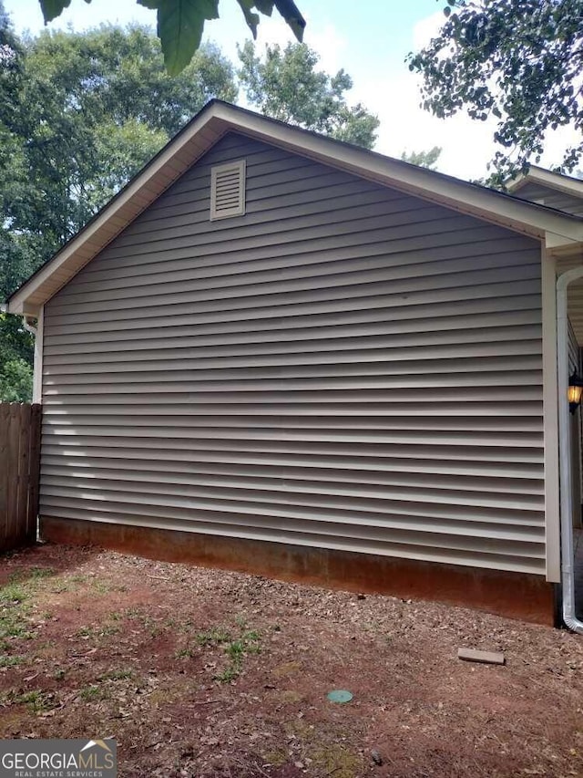 115 Elberta St, Mcdonough, GA 30253 - view of side of home with fence