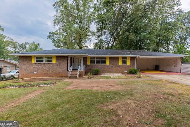 single story home featuring a carport and a front lawn